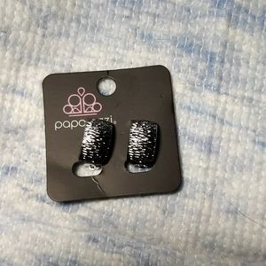 Clip on earrings. Nice silver looking hoops.